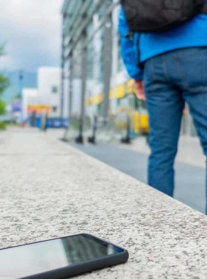 person-forgot-phone-on-bench